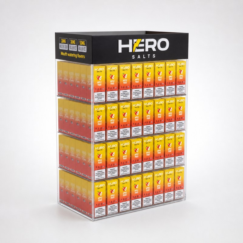 Stocked clear acrylic four-tier display containing boxed e-liquid, with a black header, left front view.